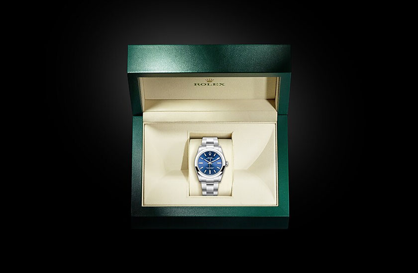 Estuche Reloj Rolex Oyster Perpetual 34 acero Oystersteel y esfera color azul vivo Joyería Grau